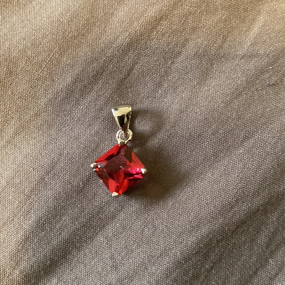 Never used 100% 925 Sterling Silver Pendant with Red Stone